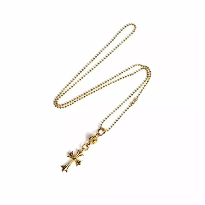 CH 22K GOLD CROSS WITH ONE GOLD BALL CHARM